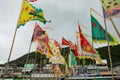 Multi-colored flags fluttering on a cloudy windy day in Hong Kong