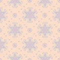 Multi colored floral seamless pattern. Beige background with violet and blue flower elements Royalty Free Stock Photo