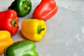 Multi-colored fresh bell peppers. Green, red and yellow vegetables. Organic healthy food concept. Top view, copy space Royalty Free Stock Photo