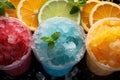 Multi-colored frozen ice drink made from juice. Sweet and very cold fruit lemonade. A variety with different cocktail flavors. Royalty Free Stock Photo