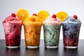 Multi-colored frozen ice drink made from juice. Sweet and very cold fruit lemonade. A variety with different cocktail flavors. Royalty Free Stock Photo