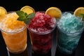 Multi-colored frozen ice drink made from juice. Sweet and very cold fruit lemonade. A variety with different cocktail flavors. Royalty Free Stock Photo