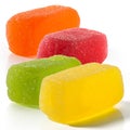 Multi colored fruit chewy candy on a white background Royalty Free Stock Photo