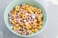 Multi colored fruit loops in a bowl Royalty Free Stock Photo