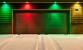 Multi-Colored Garage Door and Snowy Driveway Royalty Free Stock Photo