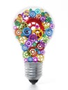 Multi colored gears in motion inside lightbulb. 3D illustration