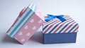 A multi-colored gift box with an open lid. Empty gift boxes on white background with shadow, isolated