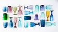 Multi-colored glass empty wine glasses and glasses lie on a white background. Beautiful vintage tableware made of multi-colored Royalty Free Stock Photo