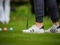 Multi-colored golf balls on green grass. Golf Club. Sports and recreation