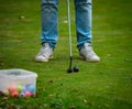 Multi-colored golf balls on green grass. Golf Club. Sports and recreation Royalty Free Stock Photo