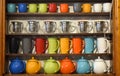 Multi colored hand made pieces of ceramic and transparent tea pots Royalty Free Stock Photo