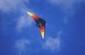 Multi-colored hang glider in mid-air, Hang Gliding Festival, telluride, Colorado