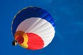 Multi colored hot air balloon on a blue sky 1 Royalty Free Stock Photo