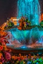 Multi colored illuminated fountain, Timisoara, Romania Royalty Free Stock Photo