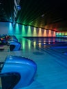 Multi-colored illumination of lanes in a huge bowling alley