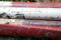 Multi colored image of show jumping poles at the show jumping arena. Wooden barriers for jumping horses as a background Royalty Free Stock Photo