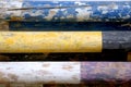 Multi colored image of show jumping poles at the show jumping arena. Wooden barriers for jumping horses as a background Royalty Free Stock Photo