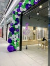 Multi-colored inflatable balls. The entrance is an arch made of balloons. Opening of a store in a shopping center. Kiev region,