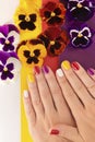 Multi-colored juicy manicure on short female nails Royalty Free Stock Photo