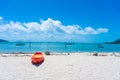 Multi-colored kayaks on a tropical sandy beach. Kayak rental. Tourist entertainment Royalty Free Stock Photo