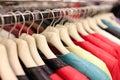 Multi-colored leather jackets hang on hanger in store