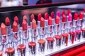 Multi-colored lipstick testers in the store. Close-up