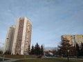 Multi-colored modern multi-storey residential building and multi-apartment panel house with Windows and balconies Royalty Free Stock Photo