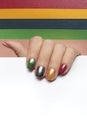 Multi-colored mother of pearl manicure on short nails.Nail art. Royalty Free Stock Photo