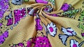 Multi colored, natural silk fabric with wonderful floral pattern..