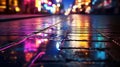 Multi-colored neon lights on a dark city street, reflection of neon light in puddles and water.