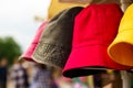 Multi-colored Panama hats on the counter of a trade tent at a fair. Royalty Free Stock Photo