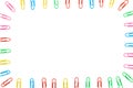 Multi-colored paper clip top view On White background Royalty Free Stock Photo