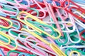 Multi-colored paper clips as background Royalty Free Stock Photo