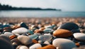 Multi-colored pebbles on the seashore. Smooth rocks at sunset Sea stones. AI generated Royalty Free Stock Photo