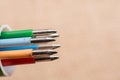 Multi colored pen on a textured background Royalty Free Stock Photo