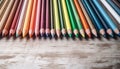 Multi colored pencil colors on wood, education in vibrant rainbow backgrounds generated by AI Royalty Free Stock Photo
