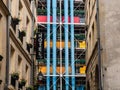 Multi -colored pipes in the center of Pompidu in Paris, the view from the alley