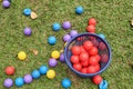 Multi-colored plastic balls on outdoor grass Royalty Free Stock Photo