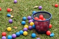 Multi-colored plastic balls on outdoor grass Royalty Free Stock Photo