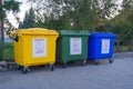 Multi-colored plastic containers for separate waste collection