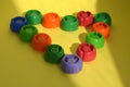 Multi-colored plastic corks from baby food, zero life-style waste, recycling garbage