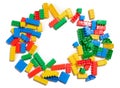 Multi-colored plastic cubes of a children\'s designer on a white isolated background, top view Royalty Free Stock Photo