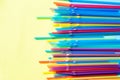 Multi colored plastic drinking straw on pastel background.plastic straws used for drinking water or soft drinks. Concept Royalty Free Stock Photo