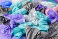 Multi-colored plastic garbage bags rolled into bows Royalty Free Stock Photo