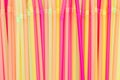 Multi colored plastic straws background