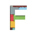 Multi-colored plasticine font. Letter F cut out of paper on a background of pieces of colored plasticine. A set of volumetric