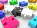 Multi colored puzzle pieces in the middle of a three black and white puzzle piece Royalty Free Stock Photo