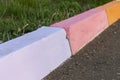 Multi-colored road borders. kerbstones Royalty Free Stock Photo