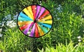 Multi colored round pinwheel in motion Royalty Free Stock Photo