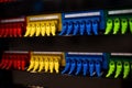 Multi-colored rows of network cables are connected to the system Royalty Free Stock Photo